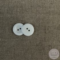 Széles peremű, hófehér kabátgomb