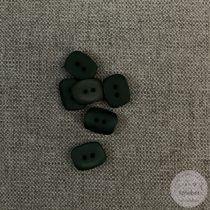 Csillogó zöld, színén domború