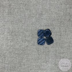 Sötét szürke, sréhen bemélyedések