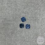 Szürke, sréhen bemélyedések