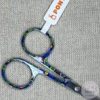 Apró gombokkal díszitett kézimunka olló