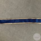 Arany széllel királykék alapon arany vonalkák