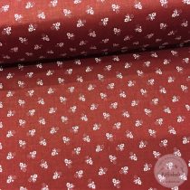 Paprika piros alapon elszórt, apró, fehér virágok