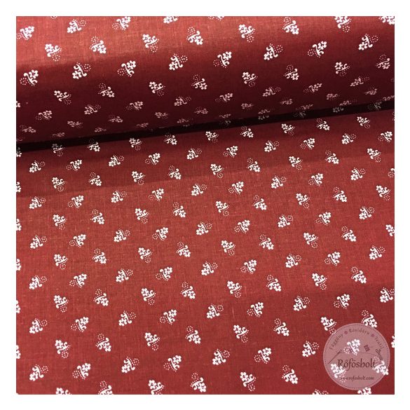 Paprika piros alapon elszórt, apró, fehér virágok