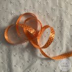 Narancs alapon fekete, apró pöttyök