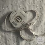 Pezsgőszínű alapon fekete, apró pöttyök