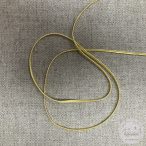 Sujtás: fénylő arany