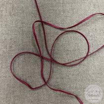 Sujtás: málna színű