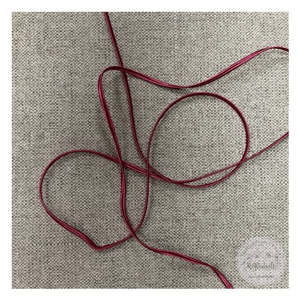 Sujtás: málna színű