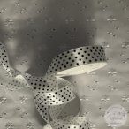 Fehér alapon fekete pöttyök