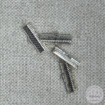 Ezüst színű végzáró