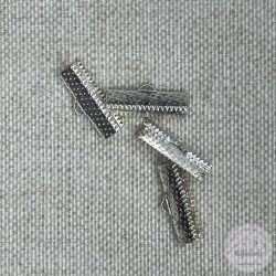 Ezüst színű végzáró